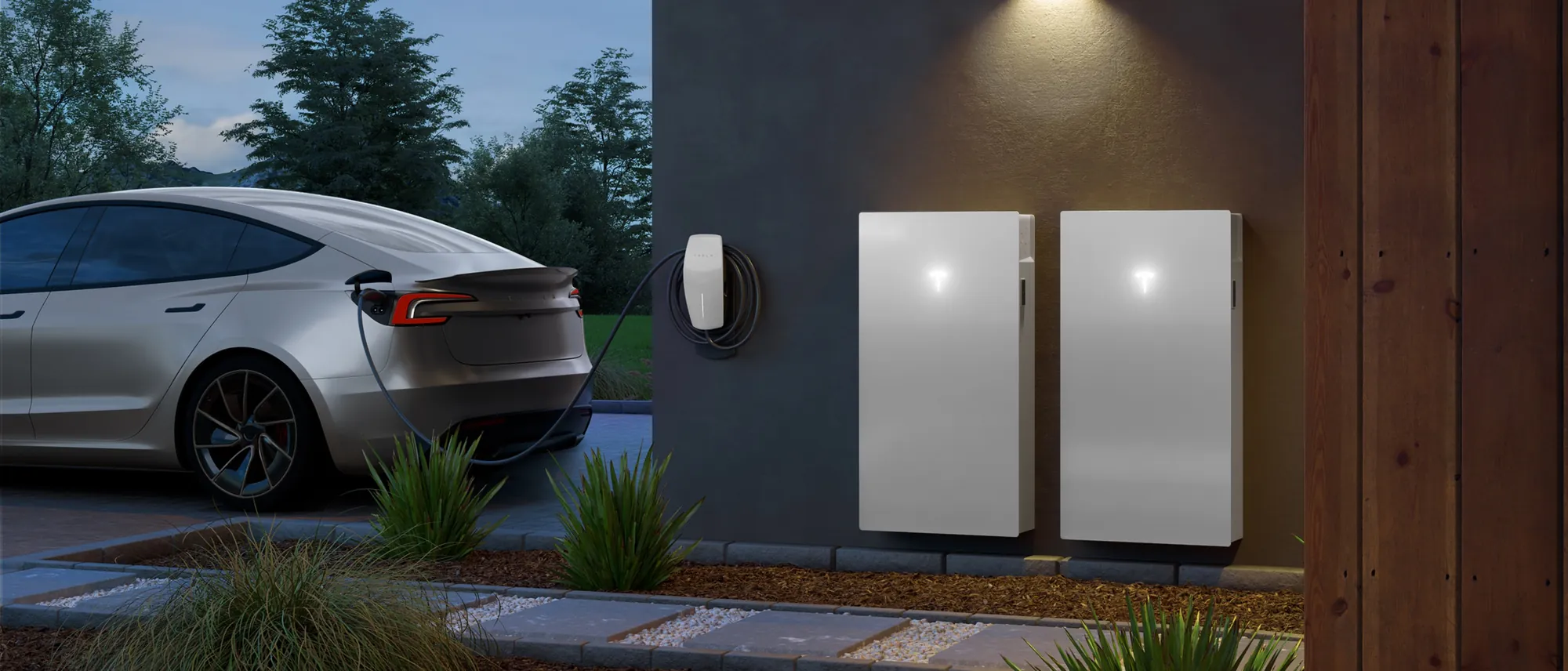 Two Tesla Powerwall units and a Wall Connector charging a vehicle at dusk